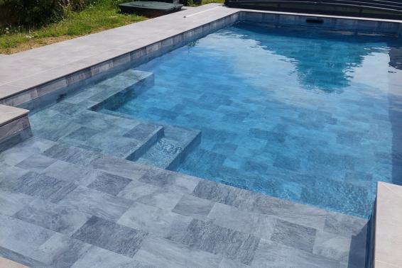 Rénovation d'une piscine type panneau